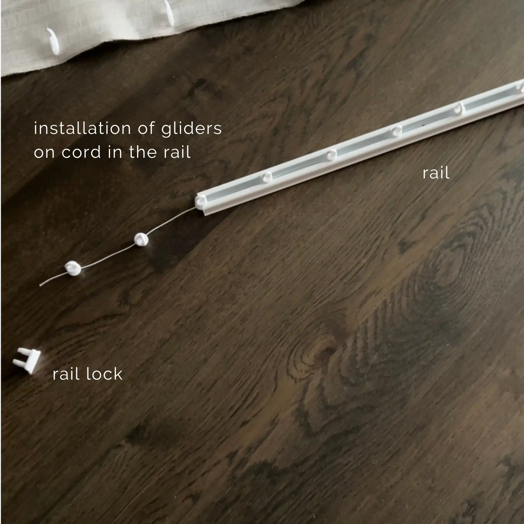 installation of gliders on cord in the rail